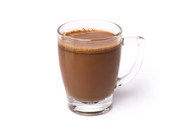 Pouring hot milk over a chocolate bar for smooth and creamy hot chocolate